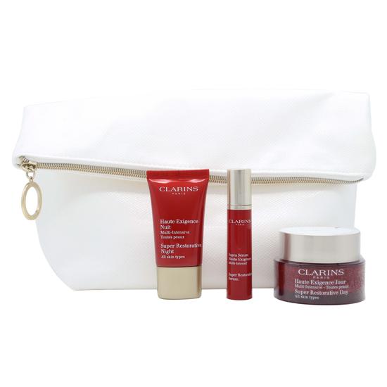 Clarins Haute Exigence Gift Set 50ml Super Restorative Day Cream + 15ml Super Restorative Night Cream + 10ml Super Restorative Serum + Pouch